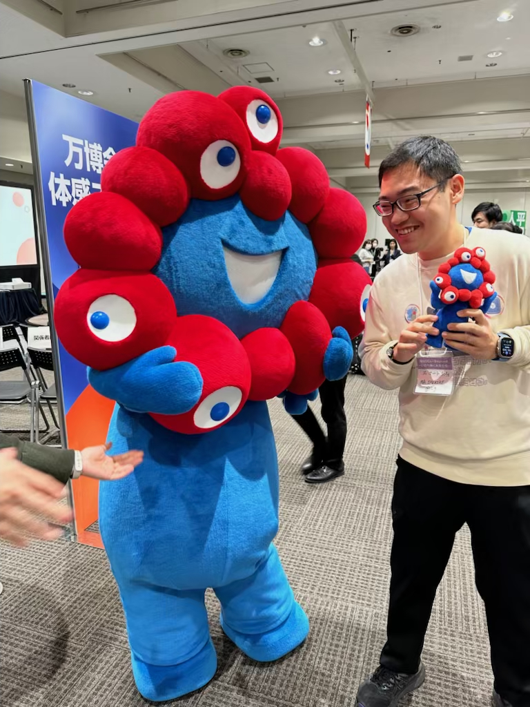 Posing with the Myaku-Myaku mascot.